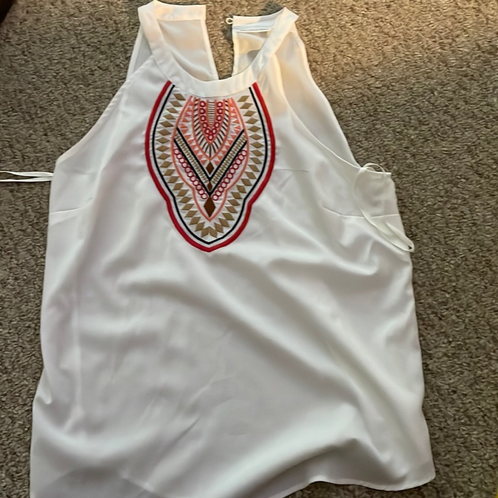 White sleeveless shirt